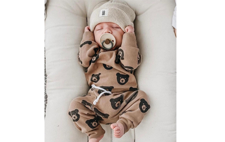 Baby clothing set and beanie made by Bossy Beans.